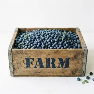 Rustic wooden crate labeled Farm